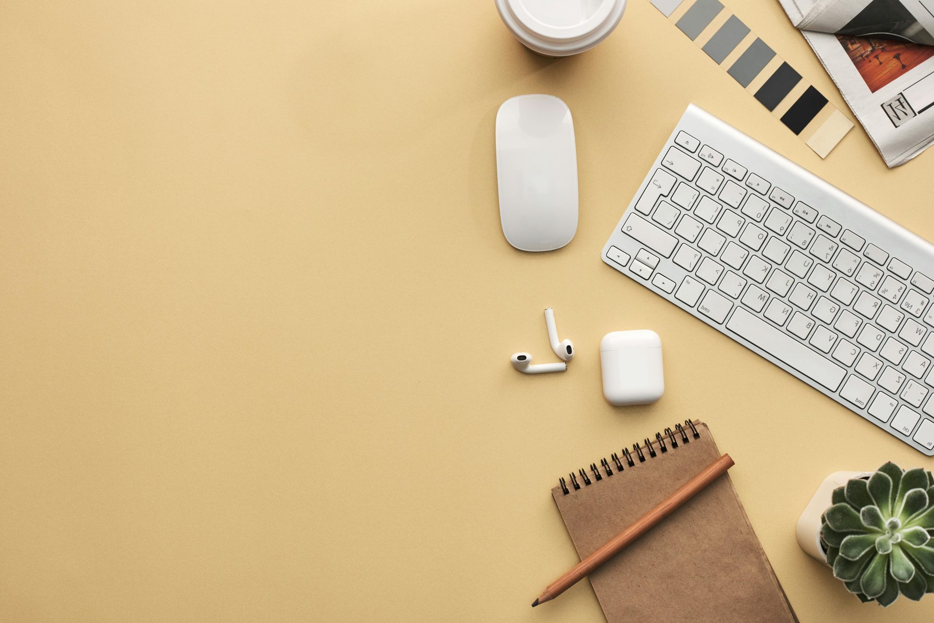 Minimalist desk setup with keyboard and accessories
