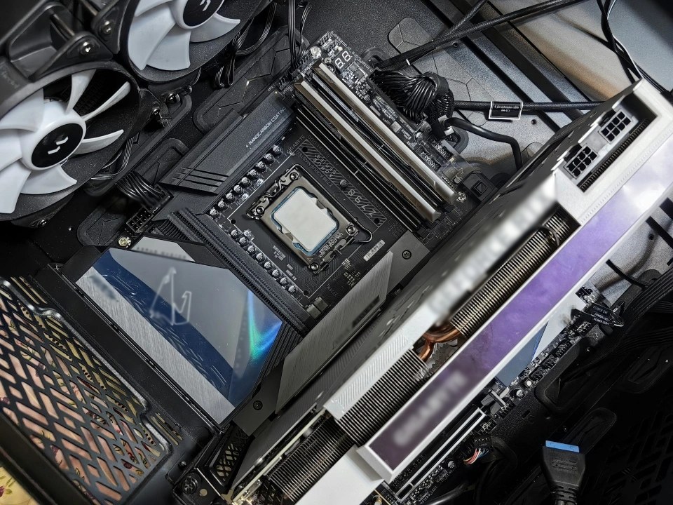 PC motherboard with graphics card and components.